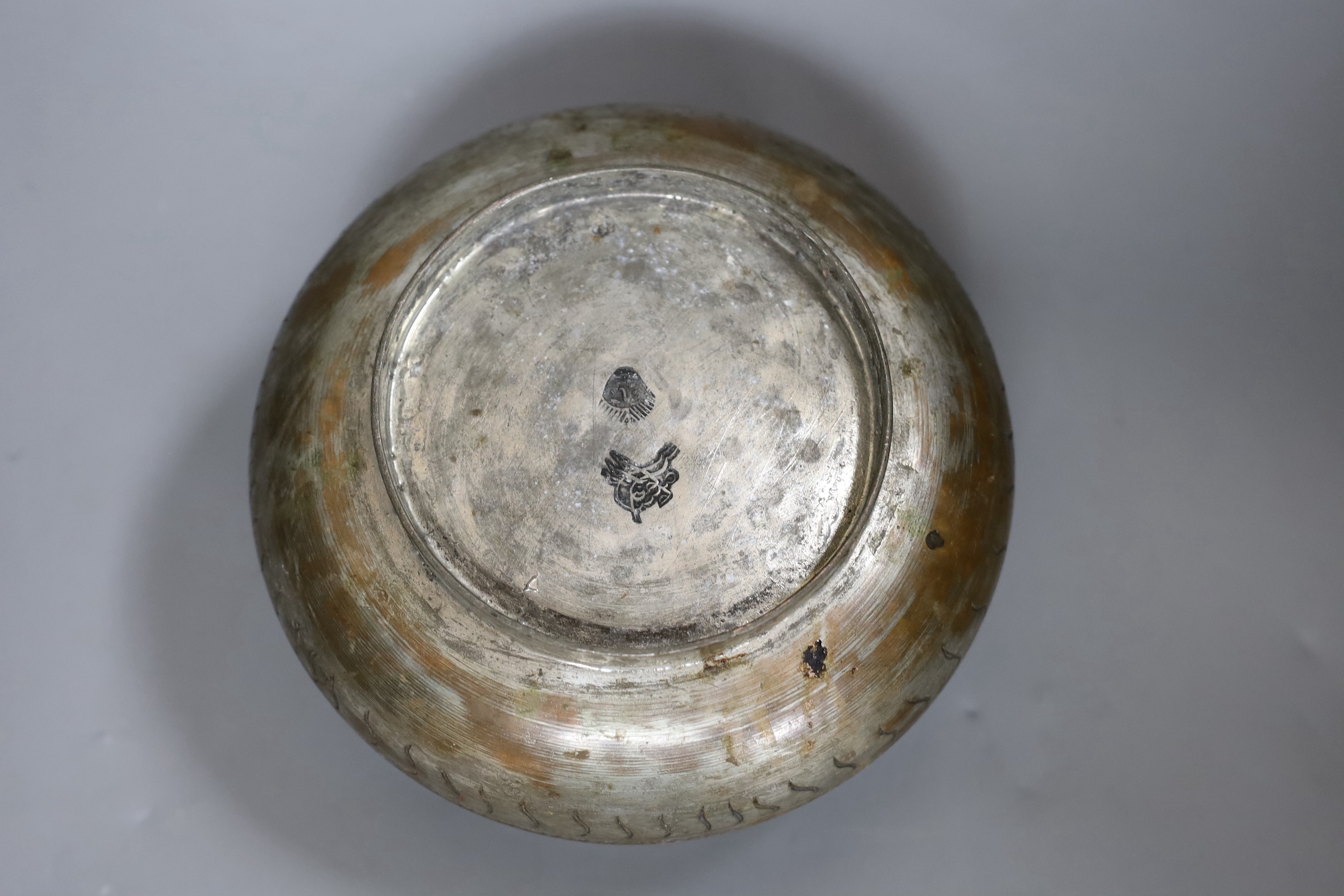 An Islamic tinned copper bowl, circa 1900, Tughra mark to base. 19cm